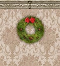 Christmas Wreath on Tan Damask Wallpaper With Ornate Molding