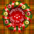 Christmas wreath on a tan plaid background Royalty Free Stock Photo