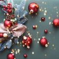 Christmas wreath with toys on the Christmas tree on a green background. Royalty Free Stock Photo