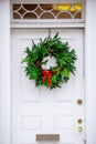 Christmas Wreath on White Door Royalty Free Stock Photo