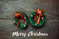 Christmas wreath on wooden background with copy space. Royalty Free Stock Photo