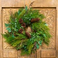 Christmas Wreath on Wooden Door