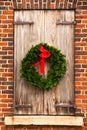 Christmas Wreath, Wooden Shutters, Red Brick Wall