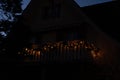 Christmas wreaths with candle lights on balcony in front of a house Royalty Free Stock Photo