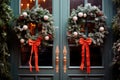 Christmas wreaths on the front doors of the house