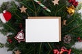 Christmas 5x7 card mockup template with envelop on natural fir twigs background Royalty Free Stock Photo