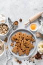 Christmas or X-mas baking culinary background, cooking recipe. Xmas gingerbread on kitchen table and ingredients for cooking Royalty Free Stock Photo