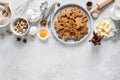 Christmas or X-mas baking culinary background, cooking recipe. Xmas gingerbread on kitchen table and ingredients for cooking Royalty Free Stock Photo