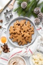 Christmas or X-mas baking culinary background, cooking recipe. Xmas, Noel gingerbread cookies on kitchen table and ingredients Royalty Free Stock Photo