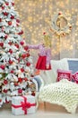 Christmas xmas casual gold studio decorations with cute girl and huge mirror with golden frame plenty presents and big green pine