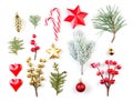 Christmas. Xmas composition with green fir twig, red holly berries, baubles and golden star isolated on white background Royalty Free Stock Photo