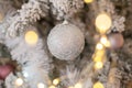 Christmas, xmas, New Year pink and turquoise fur-tree decoration with balls and bowknots, ribbons, flowers on pink lights Royalty Free Stock Photo