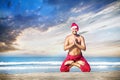 Christmas yoga on the beach Royalty Free Stock Photo