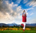 Christmas yoga tree pose