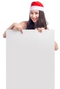 Christmas young asian woman showing blank billboard banner sign Royalty Free Stock Photo