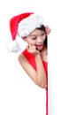 Christmas young girl showing blank billboard