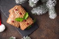 Christmas yule log cake. Traditional chocolate dessert Royalty Free Stock Photo