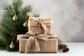 Christmas zero waste concept. Eco friendly packaging two gifts boxes in kraft paper. DIY gifts, eco decor.