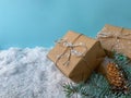 Christmas and zero waste, eco friendly packaging gifts in craft paper on a snow