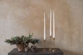 Christmastime decorations and candles on wooden table Royalty Free Stock Photo