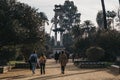 Christopher Columbus monument in Jardines de Murillo, Seville, Spain, people walk in front