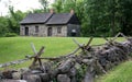 Christopher House, ca. 1720, and old stone fence, at Historic Richmond Town, Staten Island, NY, USA