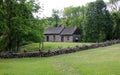 Christopher House, ca. 1720, and old stone fence, at Historic Richmond Town, Staten Island, NY, USA