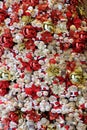 Chritmas pattern background, red and golden baubles, teddy bears and flowers Royalty Free Stock Photo