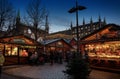 Chritsmas market with motion blurred people in front of the hist Royalty Free Stock Photo