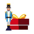 Chritsmas nutcracker with gift box Royalty Free Stock Photo