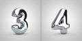 Chrome alphabet numbers 3 and 4 isolated on white background Royalty Free Stock Photo