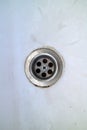 Chrome colored sink drain hole