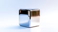 Chrome cube reflecting light on white background Royalty Free Stock Photo