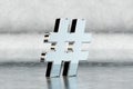 Chrome 3d hashtag symbol. Glossy chrome sign on scratched metal background. 3d rendered font character.