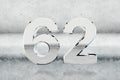 Chrome 3d number 62. Glossy chrome number on scratched metal background. 3d render