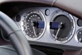 Chrome dials on fast modern car