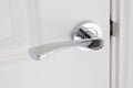 Chrome door handle in modern new home