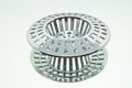 Chrome Drain Strainer On A Mirror Royalty Free Stock Photo