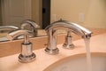 Chrome faucet in luxury bathroom Royalty Free Stock Photo