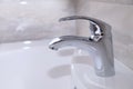 Chrome faucet in modern bathroom Royalty Free Stock Photo