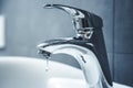 Chrome faucet washbasin. Water tap. Royalty Free Stock Photo