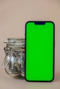 Chrome key smartphone screen mock up template in vertical position on beige background. Copy space App website