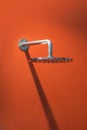 Chrome large round shower head, rain watering can in the bathroom, modern design of the wall shower tap