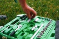 mechanics tools set. Close-up photo of a set of sockets with a screwdriver and a ratchet in a green plastic case against a Royalty Free Stock Photo