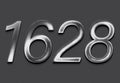 Chrome metal 3D number design of 1628 on grey background. Royalty Free Stock Photo