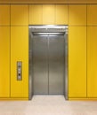 Chrome metal office building elevator doors. Open and closed variant. Realistic vector illustration yellow wall panels Royalty Free Stock Photo