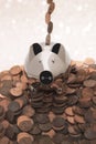 Chrome Piggy Bank With Pennies Royalty Free Stock Photo