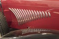 Chrome plated airway of vintage red car, Wanaka, New Zealand