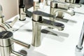 Chrome plated bathroom taps in a plumbing store Royalty Free Stock Photo