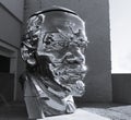 Chrome-plated Lenin head titled `Miss Mao Trying to Poise Herself at the Top of Lenin`s Head` by Chinese artist brothers Gao Zhen